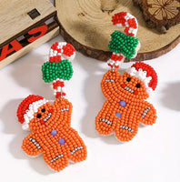 CHRISTMAS Beaded Gingerbread Boy Dangling from a Candy Cane Earrings